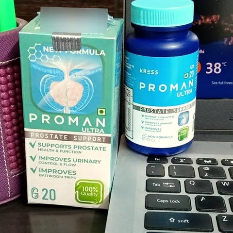 Proman Ultra box and bottle next to a laptop keyboard