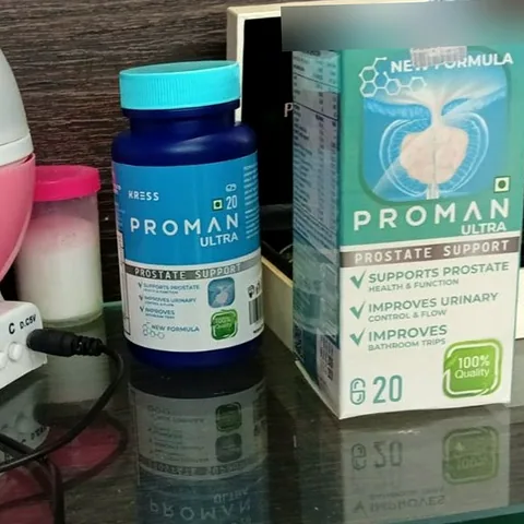 Proman Ultra bottle and box standing on a glass shelf